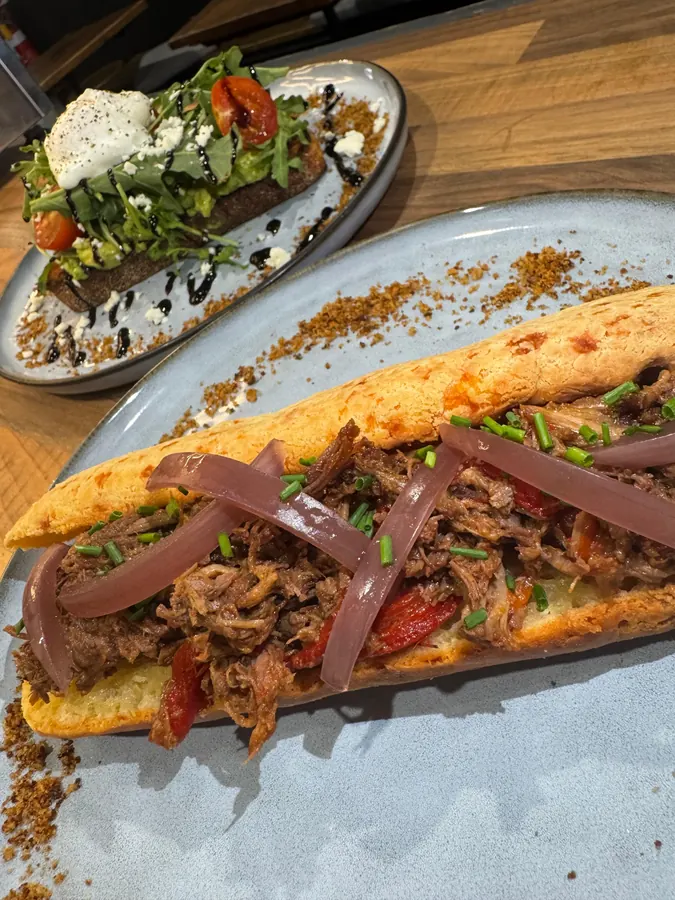 Pulled beef on a cheese bread baguette