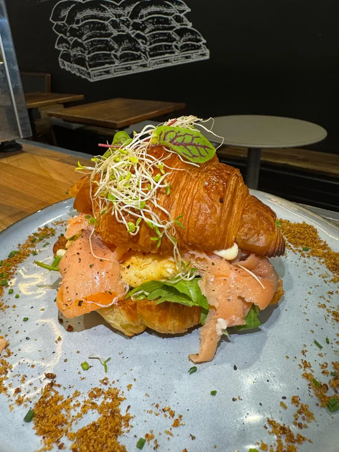 Croissant with scrambled eggs and smoked salmon