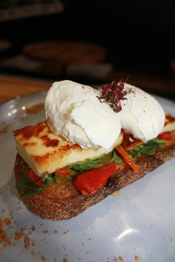 Poached eggs and grilled halloumi on sourdough
