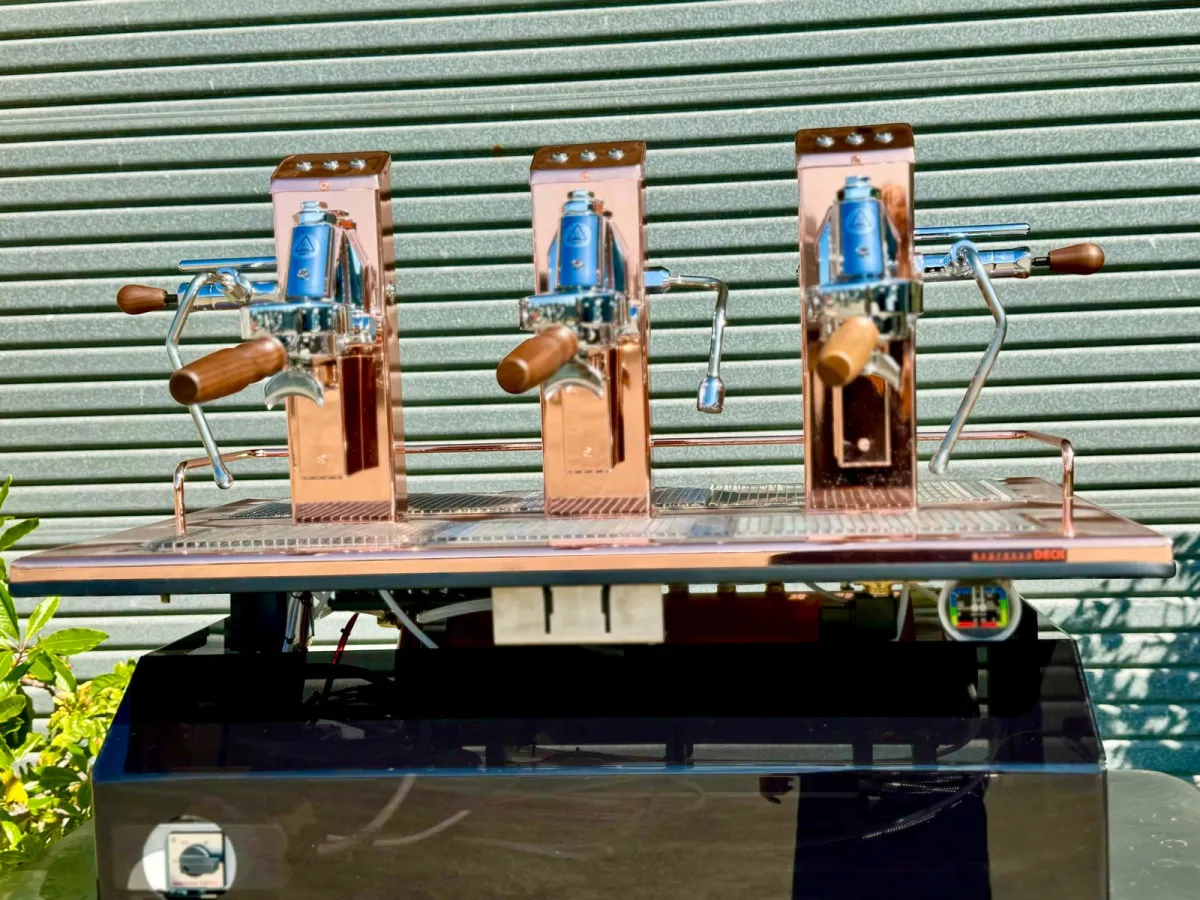 A copper three group espressoDECK, photo by espressoDECK