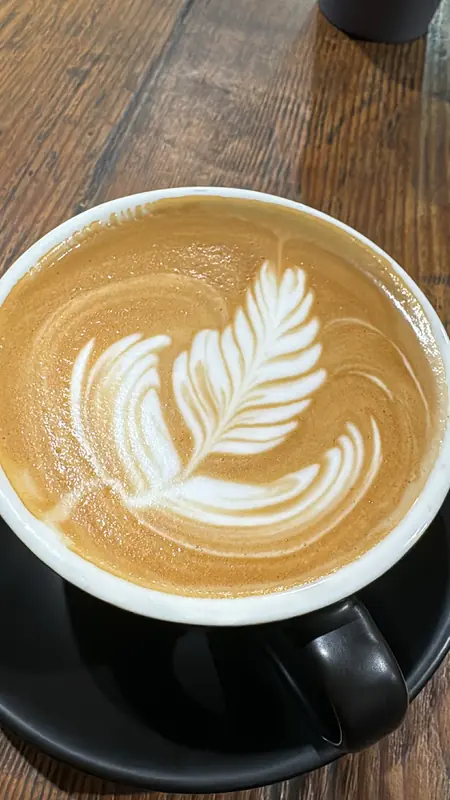 A rosetta in a black cup