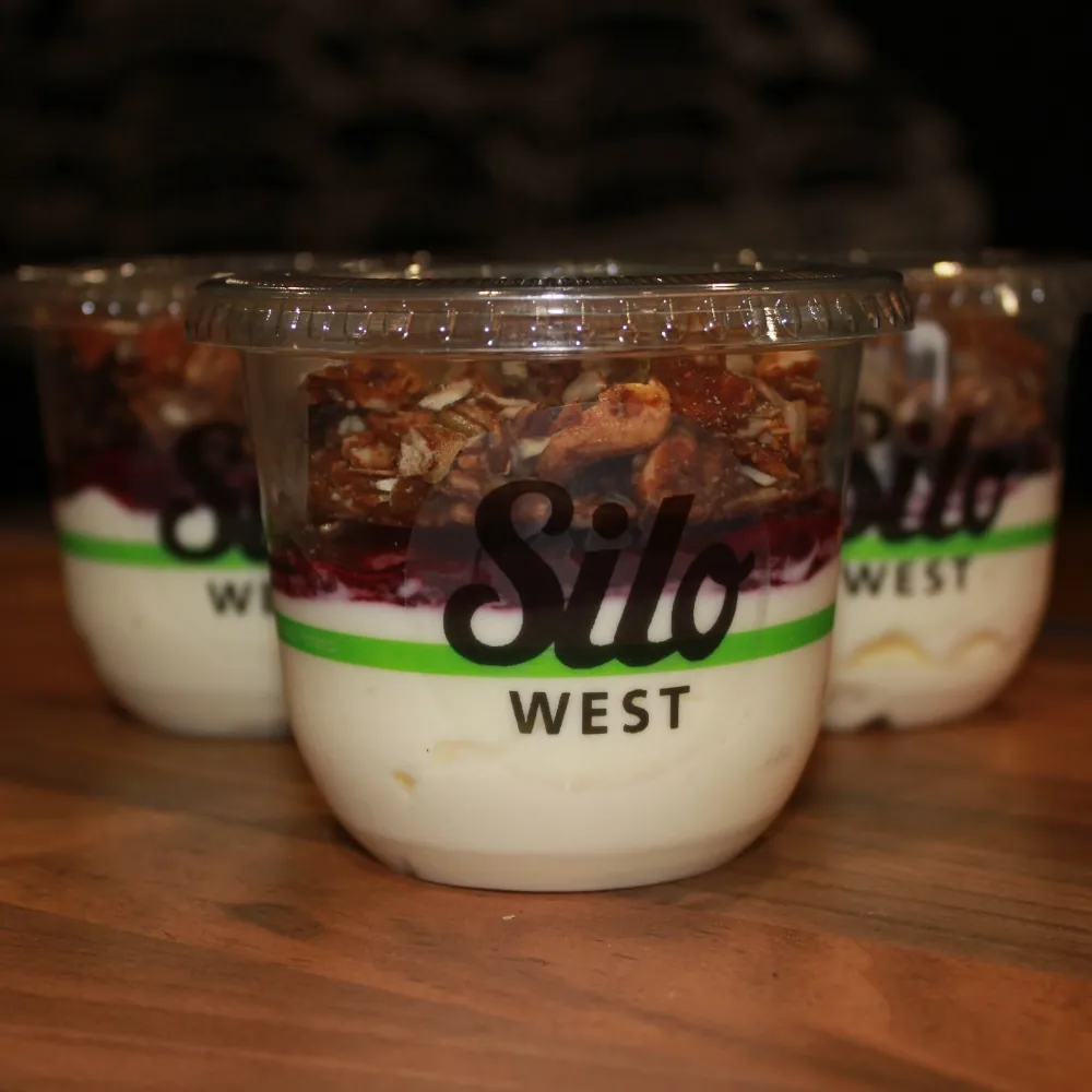 A Silo West cup of yoghurt with a berry layer and granola